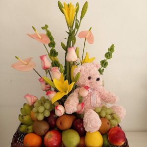 Canasta frutal con peluche